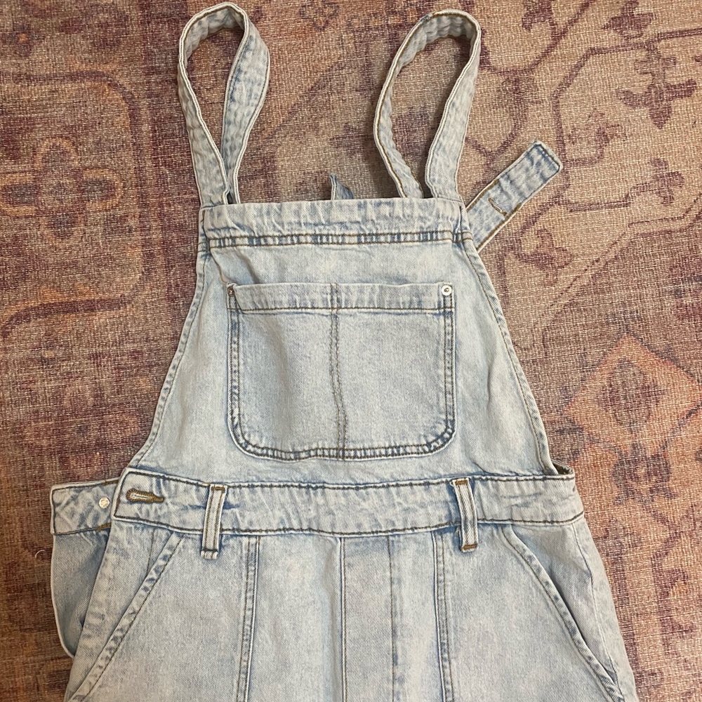 We Wore What light denim overalls